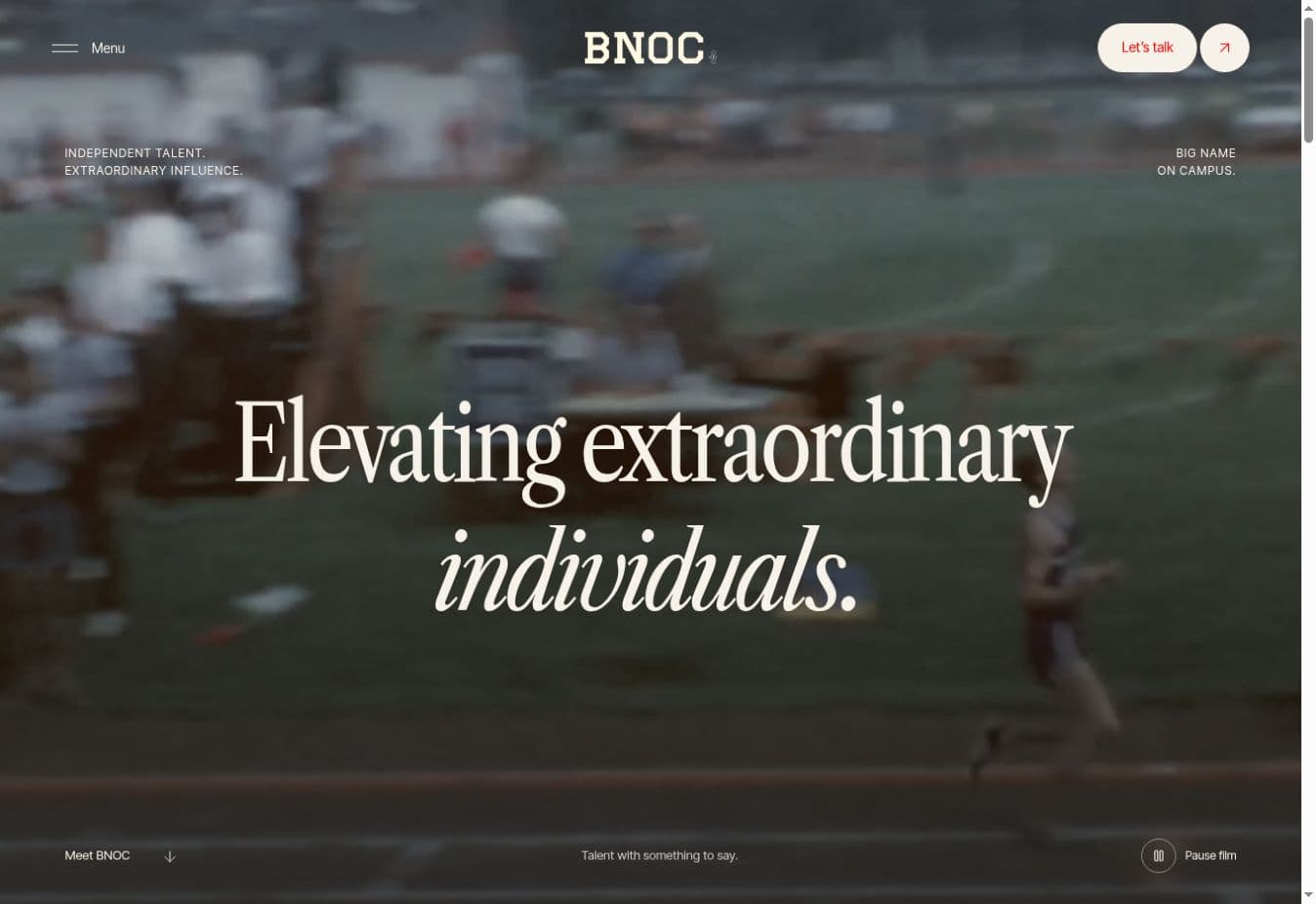 The redesigned BNOC homepage on a silver laptop